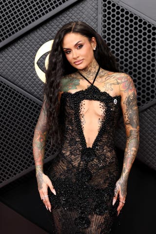 Kehlani wears an ‘ICE OUT’ pin on the Grammys red carpet